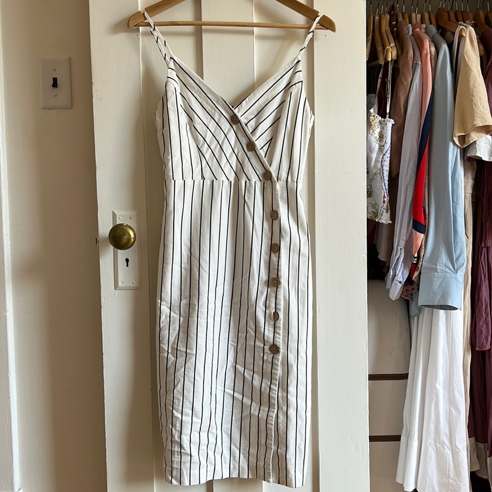 tailored riviera-inspired striped cocktail dress, knee length with slit
